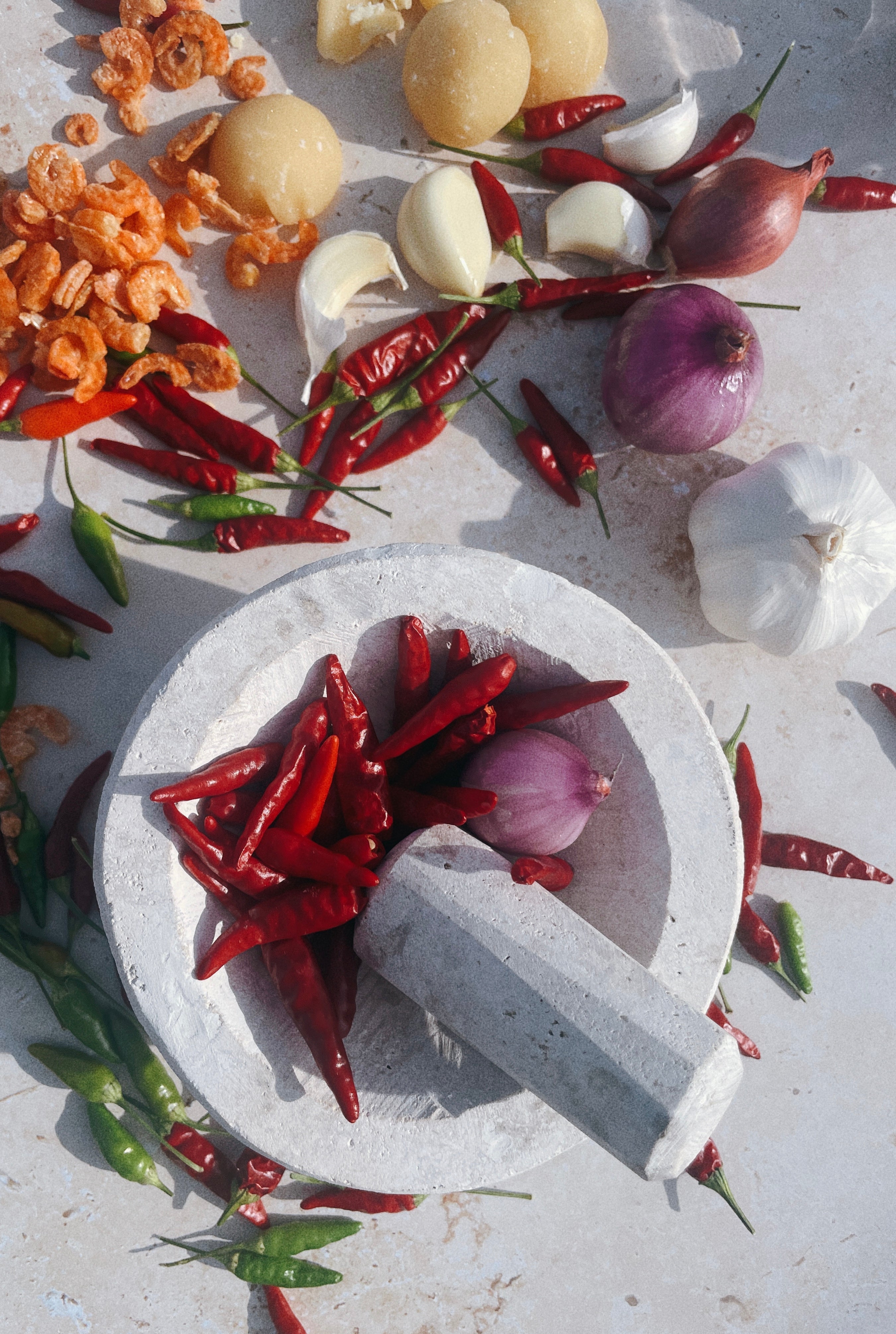 Thai food isn't defined by spice. It's defined by balance. Every squeeze of lime, splash of fish sauce, and handful of herbs has a job to do.
