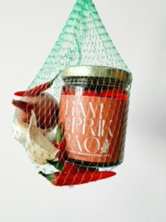 Thai pantry staples with Nam Prik Pao, fish sauce, tamarind, palm sugar, and coconut milk for everyday Thai cooking.